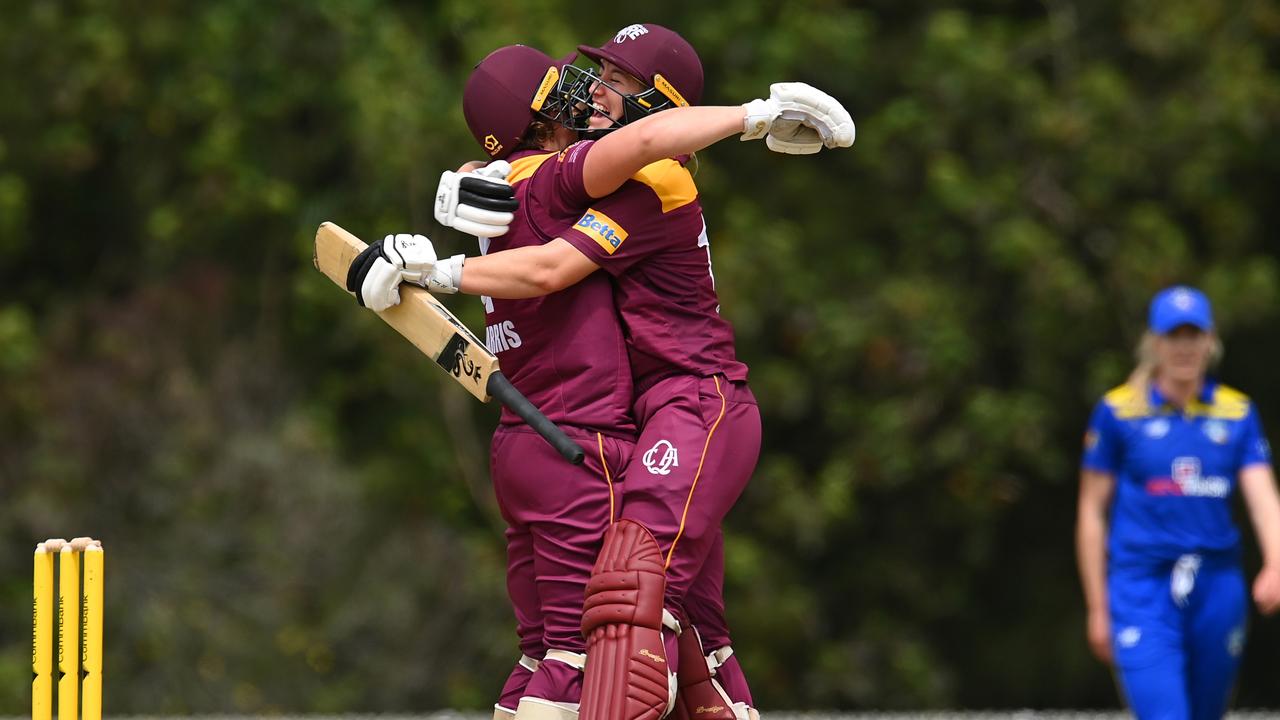 Laura Harris of Queensland celebrates her century. Photo by Albert Perez/Getty Images