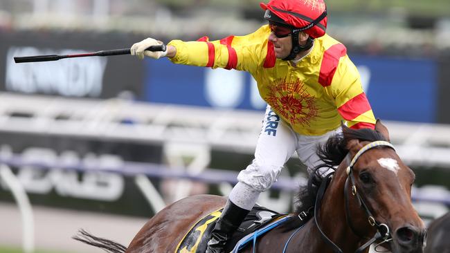 Brett Prebble celebrates aboard Legend Of Condor after winning race five. Picture: Michael Klein