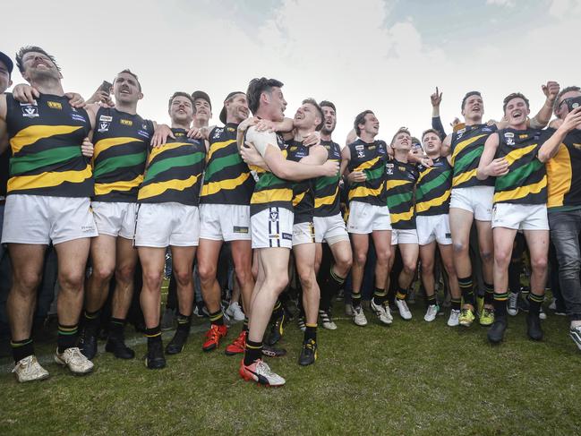 Dromana players celebrate their grand final victory over Red Hill last season. Picture: Valeriu Campan