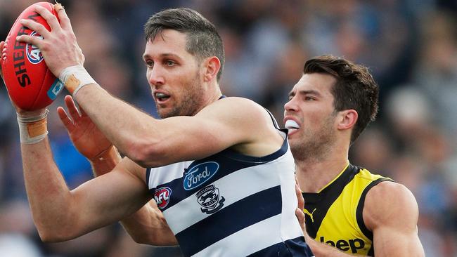 Harry Taylor stood up for the Cats opposed to Alex Rance. Picture: Getty Images