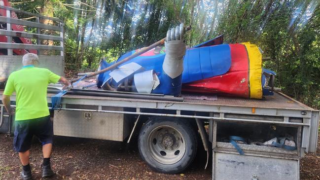 The Big Knight from the old Macadamia Castle near Ballina is strapped to a truck for the journey to the Coffs Harbour Butterfly House.