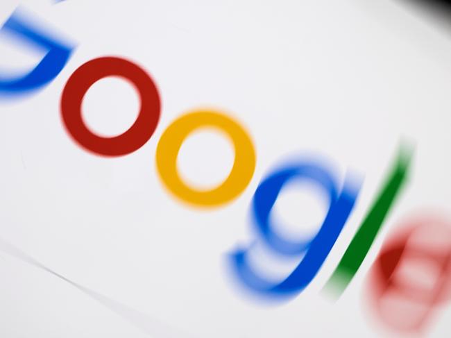 (FILES) In this file photo taken on February 04, 2019 a picture taken on February 5, 2019 shows the Google logo displayed on a tablet in Paris. - Google parent Alphabet reported a rare drop in revenue and profit on July 30, 2020, in a quarterly update that nonetheless topped market expectations. (Photo by Lionel BONAVENTURE / AFP)