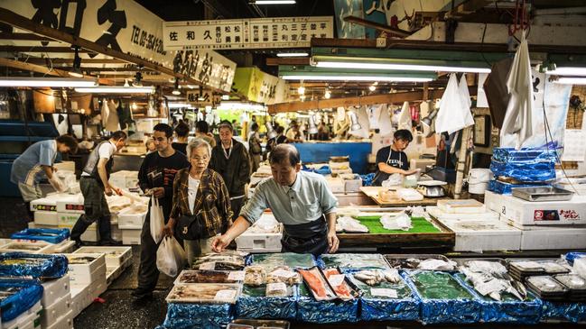 Buyers and sellers at the Tsukiji fish market in Tokyo.