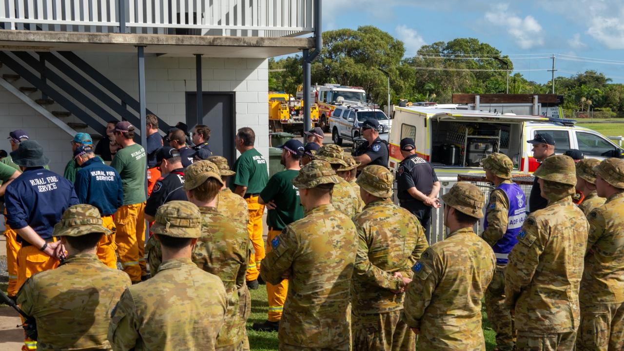 ALL HANDS ON DECK: Members of the ADF, firefighters, police and the SES helped with the clean-up of Hervey Bay in the wake of devastating floods. PHOTO: PTE Gabriel Argent