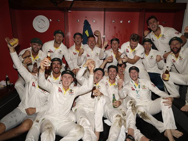 MANCHESTER, ENGLAND - SEPTEMBER 08: The Australian Cricket Team celebrate in the change rooms after Australia claimed victory to retain the Ashes during day five of the 4th Specsavers Test between England and Australia at Old Trafford on September 08, 2019 in Manchester, England. (Photo by Ryan Pierse/Getty Images)