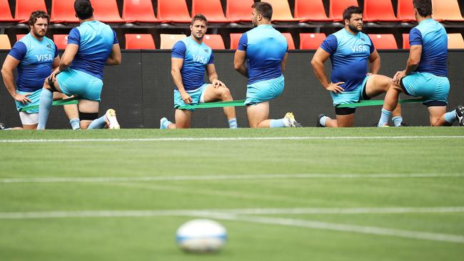 The Pumas players warm up during the captain's run at McDonald Jones Stadium in Newcastle on Friday