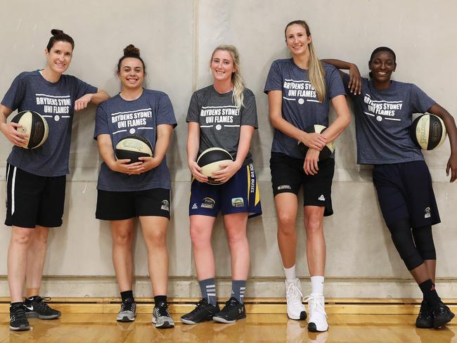 Belinda Snell, Tahlia Tupaea, Lauren Nicholson, Jennifer Hamson and Asia Taylor before last season’s WNBL finals series.