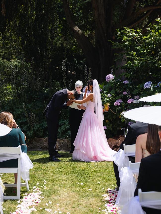 Poppy’s choice to wear a pink dress comes after Queensland influencer Tammy Hembrow did the same in her wedding. Picture: Christina Toulantas