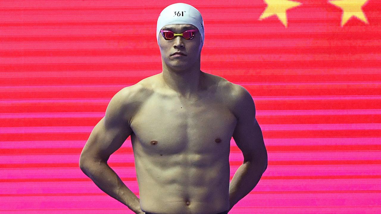 (FILES) In this file photo taken on July 24, 2019 China's Sun Yang prepares for the final of the men's 800m freestyle event during the swimming competition at the 2019 World Championships at Nambu University Municipal Aquatics Center in Gwangju, South Korea. - Chinese swimmer Sun Yang will miss the Tokyo Olympics after the Court of Arbitration for Sport increased his ban for doping charges on June 22, 2021. CAS ruled that Sun be suspended for four years and three months starting on February 28, 2020. (Photo by Manan VATSYAYANA / AFP)