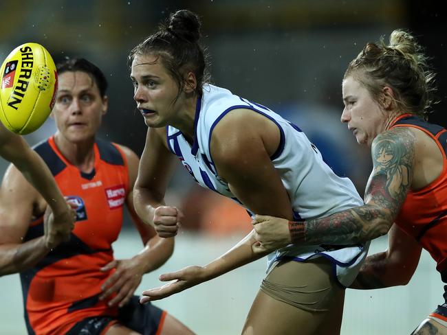 SYDNEY, AUSTRALIA - FEBRUARY 08: Jasmine Garner of the Kangaroos hand-passes during the round two AFLW match between the Greater Western Sydney Giants and North Melbourne Kangaroos at Drummoyne Oval on February 08, 2019 in Sydney, Australia. (Photo by Cameron Spencer/Getty Images)