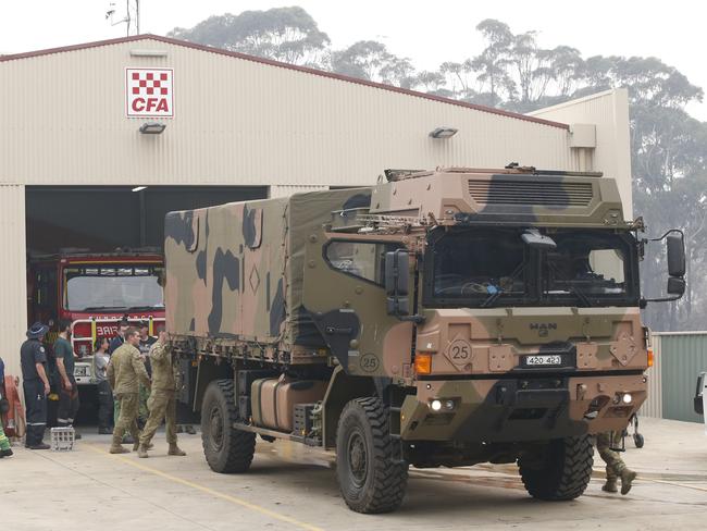 Australian Army heavy transport vehicle loaded with supplies at the Mallacoota CFA Station. Picture: David Caird