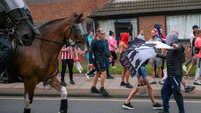 Hundreds of people, many draped in England flags, had gathered at the start of a series of anti-immigration protests in Sunderland. Picture: Ian Forsyth/Getty Images