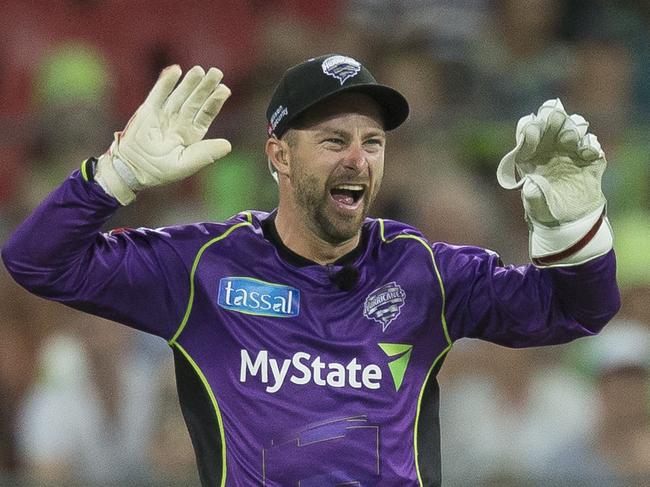 Matthew Wade of the Hurricanes celebrates after running out Jos Butler of the Thunder during the Big Bash League (BBL) cricket match between the Sydney Thunder and Hobart Hurricanes at Spotless Stadium in Sydney, Monday, January 1, 2018. (AAP Image/Craig Golding) NO ARCHIVING, EDITORIAL USE ONLY