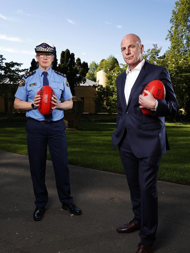 Acting Assistant Commissioner Debbie Williams and Premier Peter Gutwein to promote the not to violence campaign ahead of the AFL grand final on Saturday. Picture: Zak Simmonds