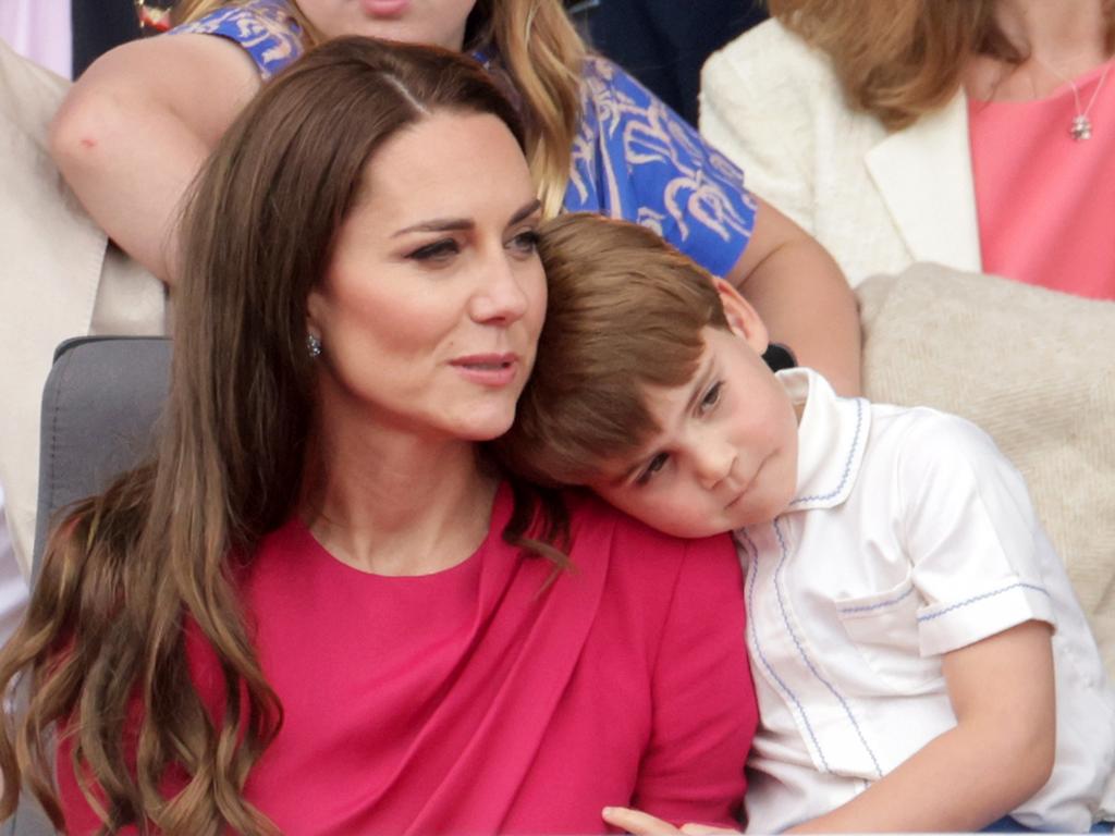 Cuddle time for Prince Louis during his big day out Picture: Getty Images