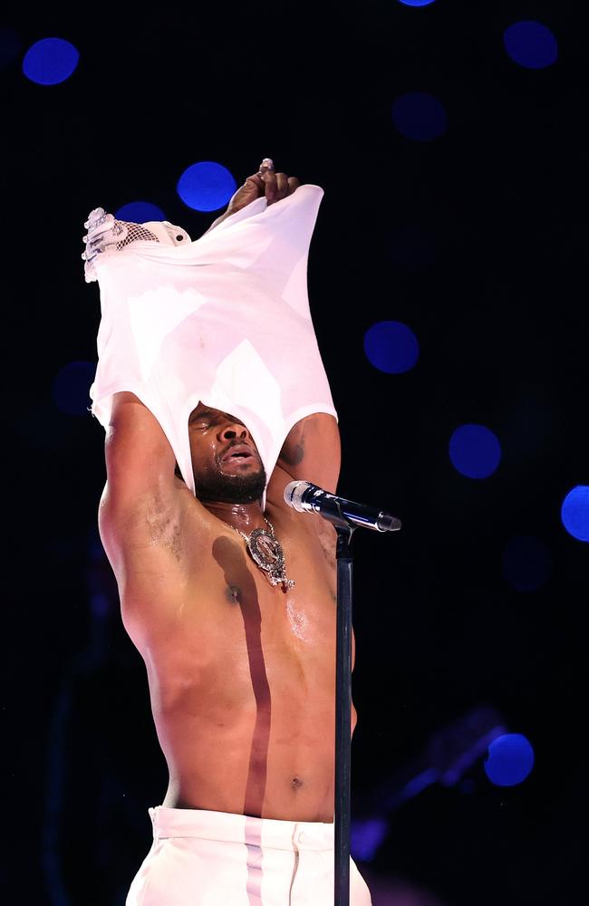 Usher gives it his all on stage at the Super Bowl. Picture: Getty Images