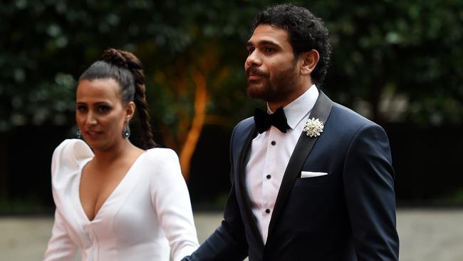 Rioli and wife Shannyn attend the 2016 Brownlow Medal count at Crown casino.