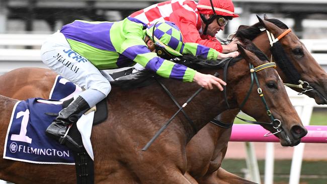 I Am A Star lunges at Bella Martini in the Let's Elope Stakes. Picture: Getty Images