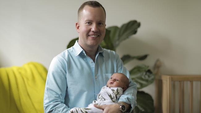 Kendall Gilding’s husband, Tim Morgan, with their new baby, Olive. Pic Mark Cranitch.