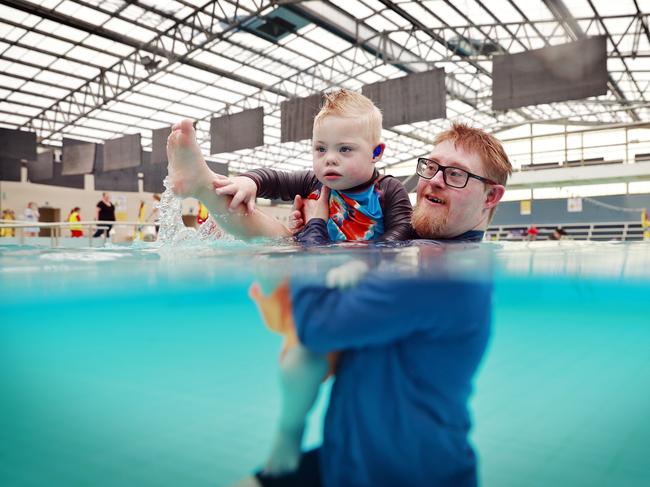 Chip Hanson showing three-year-old Jagger how to conquer the water during a swimming lesson at Wollondilly Leisure Centre. Picture: Sam Ruttyn