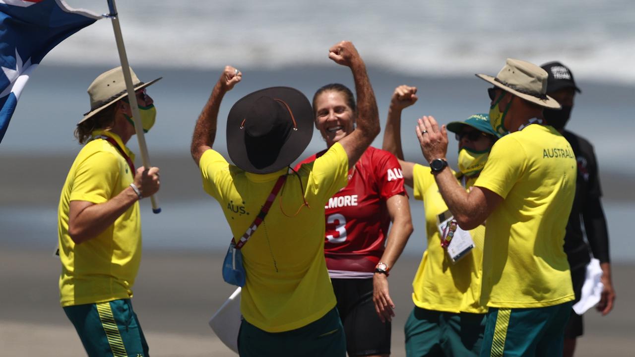 The Steph Gilmore fan club greets their hero after her win on Sunday.