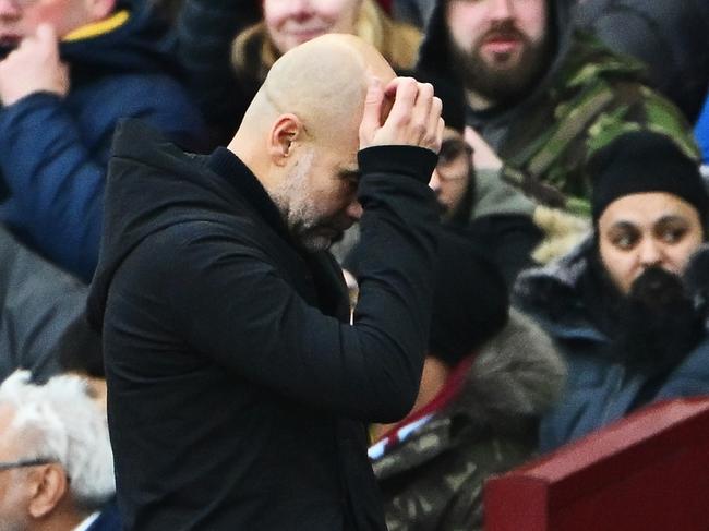 BIRMINGHAM, ENGLAND - DECEMBER 21: Pep Guardiola, Manager of Manchester City, reacts during the Premier League match between Aston Villa FC and Manchester City FC at Villa Park on December 21, 2024 in Birmingham, England. (Photo by Dan Mullan/Getty Images)