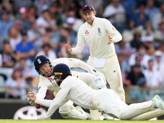 Jonny Bairstow (left) and James Vince drop Shaun Marsh late in the day.