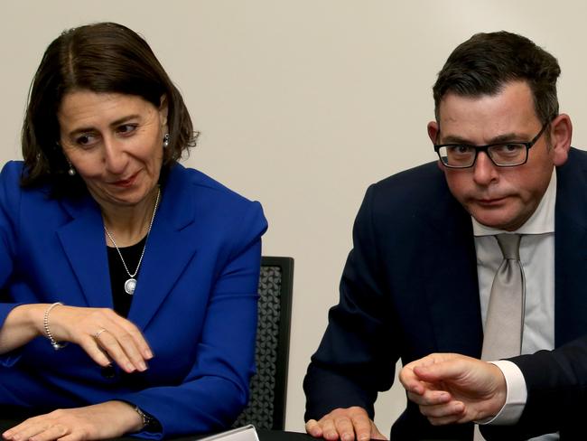 NSW Premier Gladys Berejiklian, Vic Premier Daniel Andrews and Prime Minister Scott Morrison at the  signing of  the Murray Darling  Basin  agreement  during the  COAG meeting at the Convention Centre in Cairns PICTURE: ANNA ROGERS