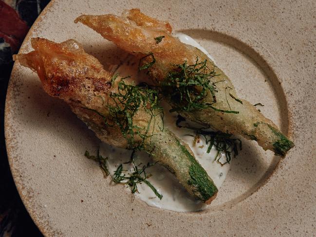 Crab masala zucchini flowers are hot property. Picture: Annika Kafcaloudis