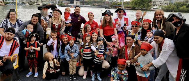 Captain Feathersword, Brisbane Lord Mayor Adrian Schrinner, Childhood Cancer Support staff and families affected by cancer, recently took over a Brisbane CityCat to enjoy a fun pirate themed day out. Picture: Supplied