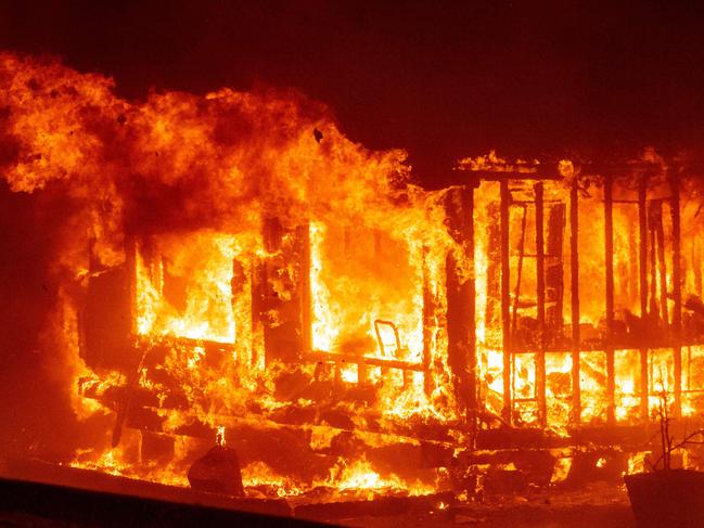 A home burns in Napa, California as flames rage through. Picture: AFP