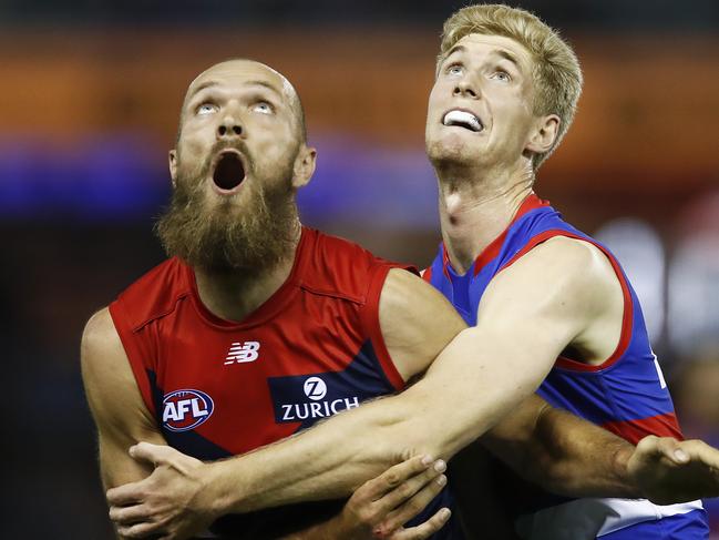 MELBOURNE, AUSTRALIA - MARCH 08: Max Gawn of the Demons and Tim English of the Bulldogs contest the ruck during the AFL Community Series match between the Western Bulldogs and the Melbourne Demons at Marvel Stadium on March 08, 2021 in Melbourne, Australia. (Photo by Daniel Pockett/Getty Images)