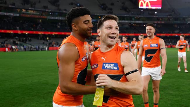 Callum Brown (left) and Toby Greene of the Giants were all smiles after the victory. (Photo by Michael Willson/AFL Photos via Getty Images)