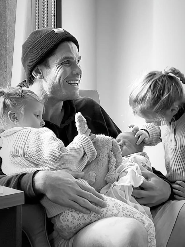 Emma Hawkins posted these gorgeous black and white images of hubby Tom with newborn son Henry and his two daughters. Picture: Instagram