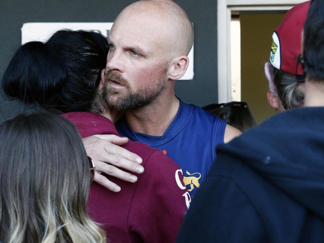 Southern league Div 3 grand final: Mt Waverley v Carrum Patterson Lakes the game was called off at half time as an all in brawl broke out as the carrrum players returned to their dressing rooms they were verbally and physically assaulted by spectators from Mt waverley. Pictured is the coach (andrew lucas) for carrum being consoled by his wife/ girlfriend. Picture: Paul Loughnan