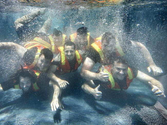 HOLD FOR SUNDAY HERALD SUN.  Melbourne's first skypool is making a splash, seven stories above the ground. The eye-catching water feature bridging the two Hawthorn Park apartment buildings. Site construction workers try their hand at Synchronised Swimming in the Skypool.   Picture: David Caird