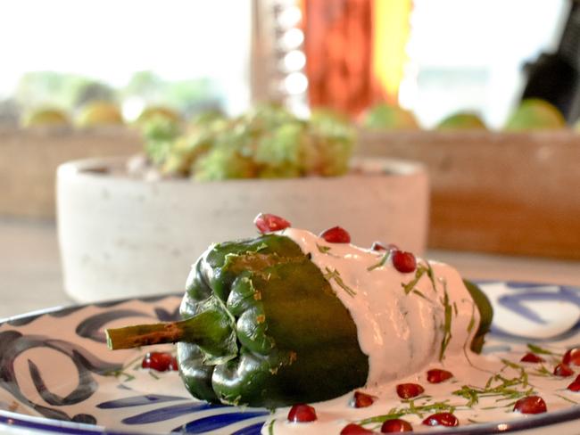 Chiles en nogoda (stuffed green capsicum with a nut sauce and pomegranate). Picture: Supplied