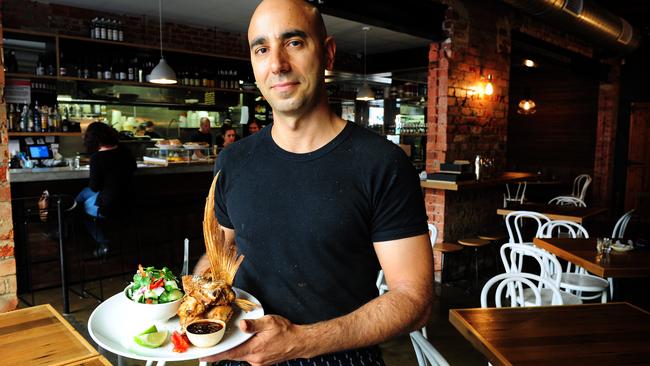 Peel Street restaurant's Jordan Theodoros with crispy fried snapper wings. This is one of Georgina’s favourite spots. Picture: Mark Brake