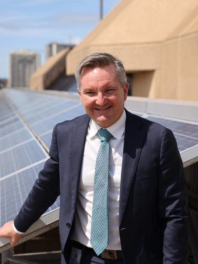 Federal Energy Minister Chris Bowen with solar panels. The government has various incentives for the take-up. Picture: David Swift