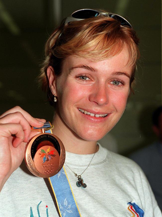 Then-Australian skier Zali Steggall holding her Winter Olympic Games bronze medal in 1998.