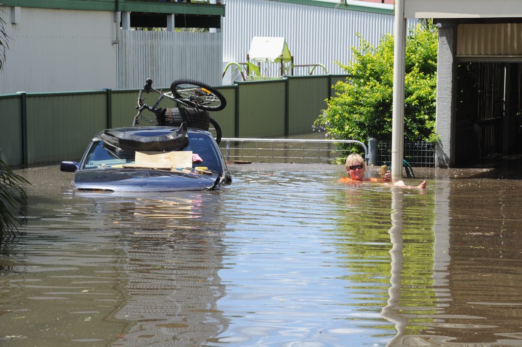 Making the best of a bad situation, Kerrin Manski at Tinana has a drink while in the 'drink'. Photo: Robyne Cuerel / Fraser Coast Chronicle. Picture: Robyne Cuerel