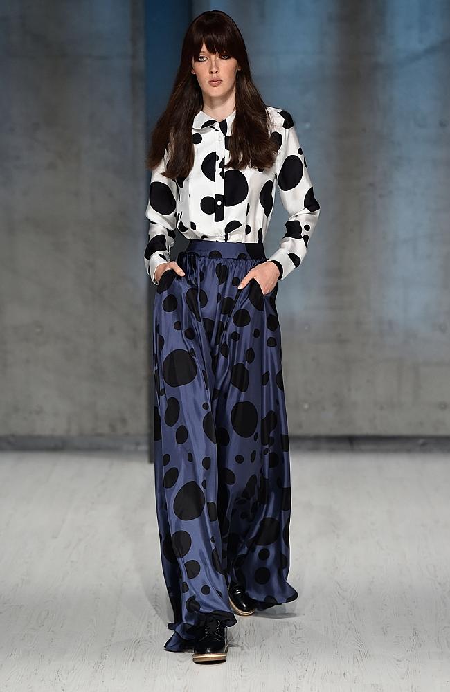 A model walks the runway at the MacGraw show during Mercedes-Benz Fashion Week Australia 2014.