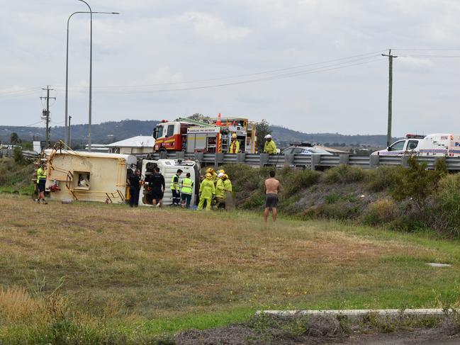 A truck has rolled on the Warrego Hwy at Crowley Vale. Photo: Hugh Suffell