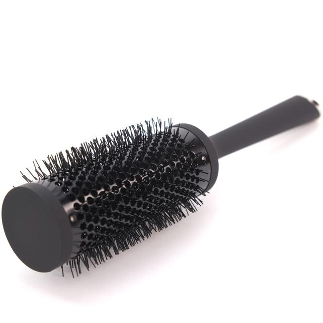 I'm a fan of this 35mm ceramic barrel brush from GHD which costs $38. Picture: Supplied