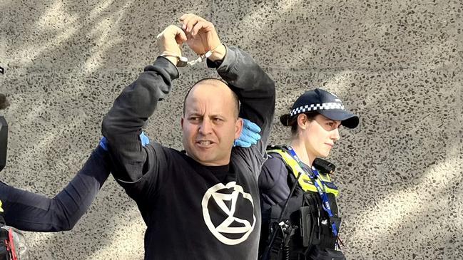 The protester was arrested by Victoria Police. Picture: Jane Morton