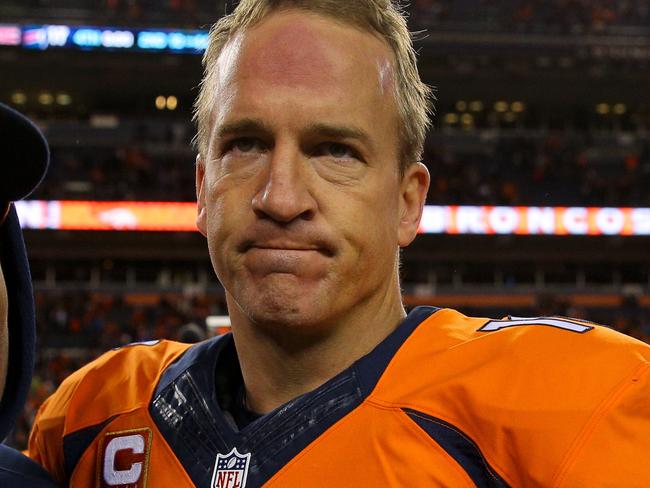 DENVER, CO - DECEMBER 7: Quarterback Peyton Manning #18 of the Denver Broncos walks on the field after the Denver Broncos defeated the Buffalo Bills 24-17 at Sports Authority Field Field at Mile High on December 7, 2014 in Denver, Colorado. Justin Edmonds/Getty Images/AFP == FOR NEWSPAPERS, INTERNET, TELCOS & TELEVISION USE ONLY ==