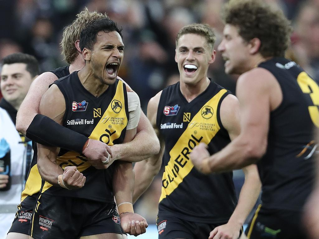 SANFL - GRAND FINAL  22/09/19 - Port Adelaide v Glenelg at Adelaide Oval. Marlon Motlop celebrates his goal late in the 4th  - with Carl Nicholson and Matthew Snook Picture SARAH REED