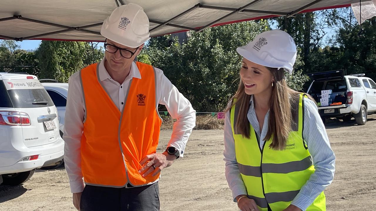 Transport Minister Bart Mellish and Housing Minister Meaghan Scanlon look over plans for the Coomera Connector