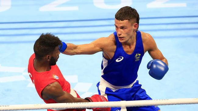 Garside in action against Andy Cruz of Cuba during the semi-final of the mens Light (57kg-63kg) boxing at the Kokugikan Arena at the 2020 Tokyo Olympics. Picture: Adam Head