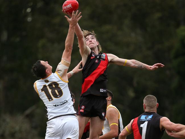 NFL: Thomastown’s Jarryd Coulson and Eltham’s Finnbar Maley jump in the ruck. Picture: Hamish Blair